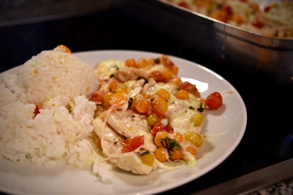 Überbackenes Hühnerschnitzel mit Paradeisern - Studentenbeisl